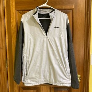 Nike golf windbreaker.  Medium.  like new.  grey on silvee